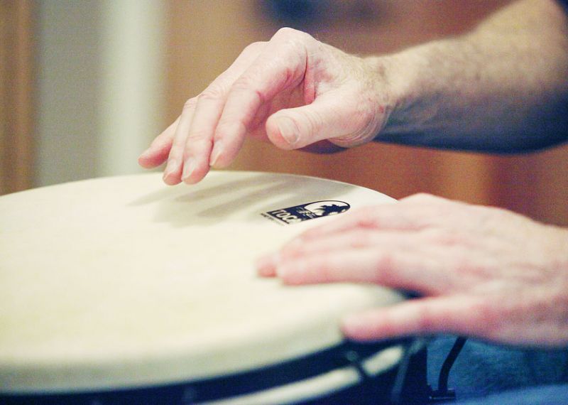 News-Register file photo##Rob Schulman plays a djembe, a type of goblet-shaped drum originating in West Africa.