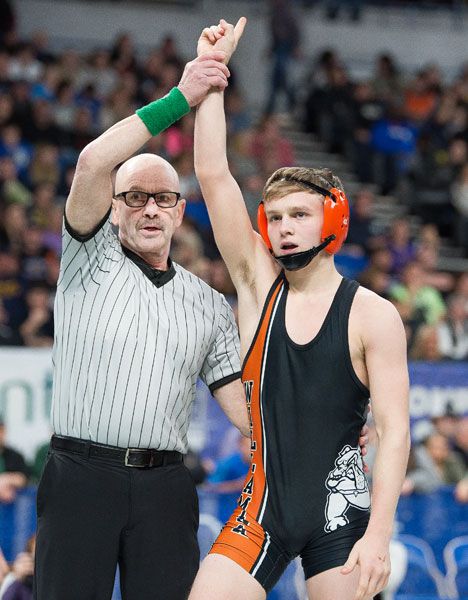Marcus Larson/News-Register##
Willamina 113-pound wrestler Moses Mercier is crowned Class 3A state champion.