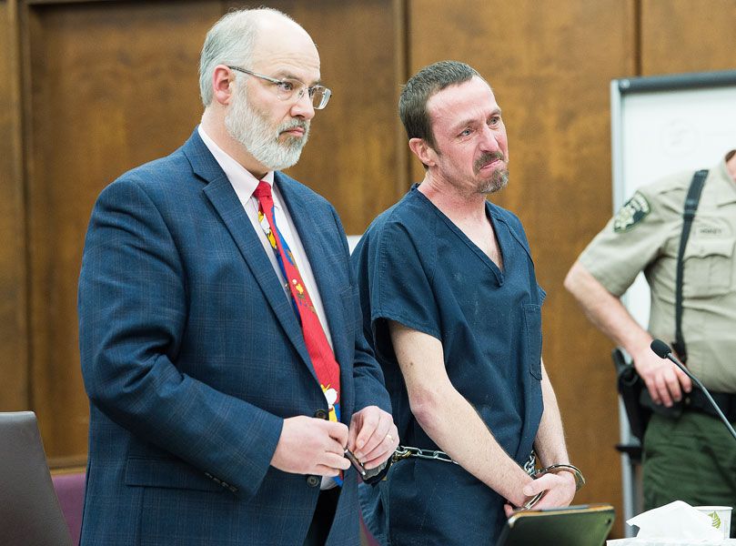 Marcus Larson/News-Register##Timothy McCready, flanked by his attorney, Mark Lawrence of McMinnville, will spend the next 13 years in prison.