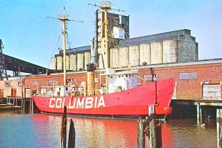 ## In this old postcard image, the Columbia (Lightship LV-88) is shown dockside after it was brought to Seattle to serve as a museum ship, in the early 1960s. This was the lightship whose crew claimed to have seen “Colossal Claude” in 1934. No. 88 went into service in 1909 and stayed there until 1939, when it was replaced with Columbia Lightship LV-93.