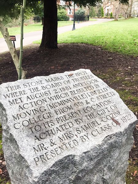 Kirby Neumann-Rea/News-Register##This 1922 commemorative stone is located at the northwest corner of the Linfield University oak grove.