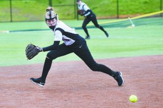 Rusty Rae/News-Register##
Ashley Rhoads looks to runs down a ground ball during Mac’s game with Central Catholic. Rusty Rae/News-Register##
Ashley Rhoads looks to runs down a ground ball during Mac’s game with Central Catholic.