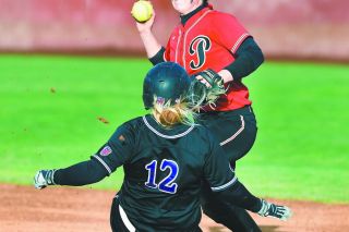 Rusty Rae/News-Register##
Linfield’s Melanie Ord (12) slides into second to break up a double-play attempt by Pacific. Rusty Rae/News-Register##
Linfield’s Melanie Ord (12) slides into second to break up a double-play attempt by Pacific.