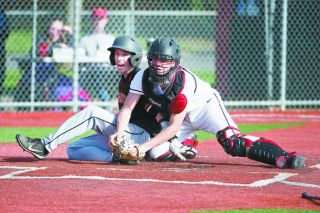 Marcus Larson/News-Register##
Kevin Sullivan tags out Cole Herschbach, saving a run, but the Grizzlies couldn’t score a run of their own. Marcus Larson/News-Register##
Kevin Sullivan tags out Cole Herschbach, saving a run, but the Grizzlies couldn’t score a run of their own.