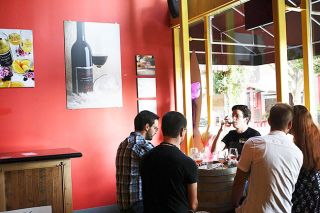 News-Register file photo##Visitors enjoy a past art walk. News-Register file photo##Visitors enjoy a past art walk.