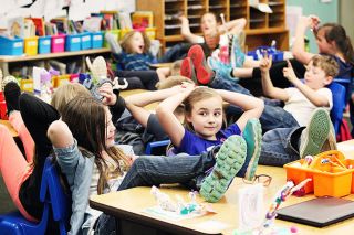 Rockne Roll / News-Register##Third-graders Ava Garcia and Josie Barker and classmates take a moment to act like the boss as a reward for maintaining positive behavior during the PAX Good Behavior Game at Yamhill-Carlton Elementary School. Rockne Roll / News-Register##Third-graders Ava Garcia and Josie Barker and classmates take a moment to act like the boss as a reward for maintaining positive behavior during the PAX Good Behavior Game at Yamhill-Carlton Elementary School.