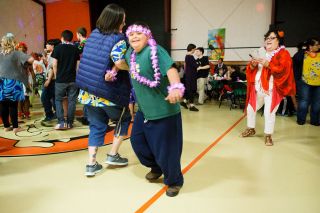Rockne Roll / News-Register##Makhi Blackcrow cuts a rug while dressed to fit in with the prom’s luau theme. Rockne Roll / News-Register##Makhi Blackcrow cuts a rug while dressed to fit in with the prom’s luau theme.