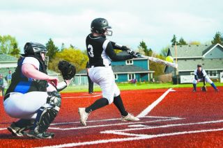 Marcus Larson/News-Register##
Dayton’s Catie Jacks belts a homerun to left field during the Pirates 5-0 victory over the Amity Warriors. Marcus Larson/News-Register##
Dayton’s Catie Jacks belts a homerun to left field during the Pirates 5-0 victory over the Amity Warriors.