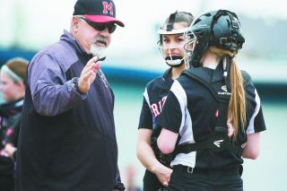 Marcus Larson/News-Register##
McMinnville head coach Larry Nichols gives instruction to Grizzly catcher Kassidee Bates (3) and pitcher Kaden Sullivan during action in the third inning in the game against West Albany. McMinnville dropped the game to the Bulldogs, 15-10 after giving up 11 runs in the first three innings. Marcus Larson/News-Register##
McMinnville head coach Larry Nichols gives instruction to Grizzly catcher Kassidee Bates (3) and pitcher Kaden Sullivan during action in the third inning in the game against West Albany. McMinnville dropped the game to the Bulldogs, 15-10 after giving up 11 runs in the first three innings.
