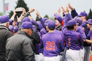 Rusty Rae/News-Register##
Linfield’s baseball team celebrates its Northwest Conference title run after the trophy presentation Sunday. The ‘Cats had to come through the consolation round by winning four straight games after a first round loss. Rusty Rae/News-Register##
Linfield’s baseball team celebrates its Northwest Conference title run after the trophy presentation Sunday. The ‘Cats had to come through the consolation round by winning four straight games after a first round loss.