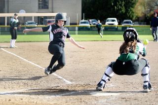 Rockne Roll/News-Register##
McMinnville’s Madison Rapp (13) dives into the plate to score the home side’s opening run in the Grizzlies’ game against West Salem, won by McMinnville, 5-4 in eight innings. Rockne Roll/News-Register##
McMinnville’s Madison Rapp (13) dives into the plate to score the home side’s opening run in the Grizzlies’ game against West Salem, won by McMinnville, 5-4 in eight innings.