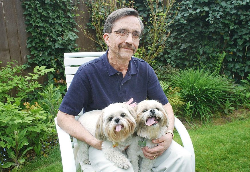 News-Register file photo##Barry Lilly poses for a 2002 News-Register feature with his two shih-tzues, Katie and Rascal, who have since passed away but are “still part of my life,” Lilly says. He lives in McMinnville with his wife, Barbara.