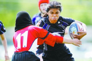 Rockne Roll/News-Register##
Itzel George powers forward in Valley Panthers’ Rugby Oregon High School Girls League match against David Douglas Saturday, at Duniway Middle School. Rockne Roll/News-Register##
Itzel George powers forward in Valley Panthers’ Rugby Oregon High School Girls League match against David Douglas Saturday, at Duniway Middle School.