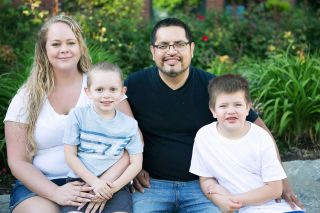 Photo by Emily Garrick-Steenson/Lutheran Community Services##As a permanent legal resident of the United States, Auxilio Maldonado no longer fears separation from his wife Britnee, 4-year-old son Gino and 8-year-old son Gordon. He’ll tell his story tomorrow during Lutheran Community Services’ Fiesta en la Plaza event. Photo by Emily Garrick-Steenson/Lutheran Community Services##As a permanent legal resident of the United States, Auxilio Maldonado no longer fears separation from his wife Britnee, 4-year-old son Gino and 8-year-old son Gordon. He’ll tell his story tomorrow during Lutheran Community Services’ Fiesta en la Plaza event.