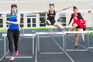Marcus Larson/News-Register##
Ronni VanZant, came from behind to take the 300 meter hurdles against Amity’s Amy Kraemer, left. Marcus Larson/News-Register##
Ronni VanZant, came from behind to take the 300 meter hurdles against Amity’s Amy Kraemer, left.