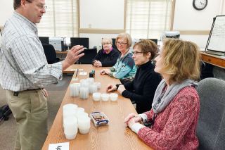 Submitted photo##Rick Peters of the Peters Company sets up a ballot counting exercise with the staff of the Yamhill County Clerk s Office. Submitted photo##Rick Peters of the Peters Company sets up a ballot counting exercise with the staff of the Yamhill County Clerk s Office.