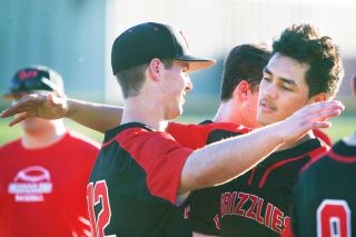 Rockne Roll/News-Register##
From right, McMinnville’s Cedric Agcaoili-Ostrom and Wyatt Smith share a hug following the Grizzlies’ OSAA State Championship first-round loss to Oregon City Monday, May 22, at Patton Middle School. Rockne Roll/News-Register##
From right, McMinnville’s Cedric Agcaoili-Ostrom and Wyatt Smith share a hug following the Grizzlies’ OSAA State Championship first-round loss to Oregon City Monday, May 22, at Patton Middle School.