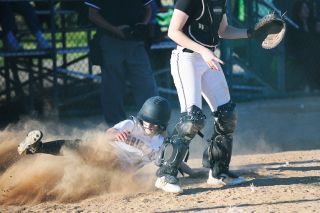 Rusty Rae/News-Register##
Madison Rapp slides home with the only run of the game for the Grizzlies in their playoff contest with Tualatin. Unfortunately, seconds after she score Ashley Rhoads was thrown out at third, ending the Mac rally. Rusty Rae/News-Register##
Madison Rapp slides home with the only run of the game for the Grizzlies in their playoff contest with Tualatin. Unfortunately, seconds after she score Ashley Rhoads was thrown out at third, ending the Mac rally.
