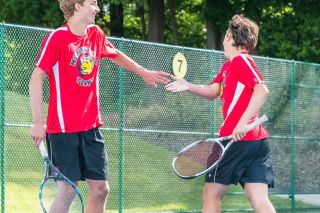 Malia Riggs for the News-Register##
Cooper Rich, left and Nick Denley, high-five after scoring the first match point at the state tournament against Clackamas. Malia Riggs for the News-Register##
Cooper Rich, left and Nick Denley, high-five after scoring the first match point at the state tournament against Clackamas.