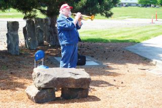 Paul Daquilante / News-Register##Robert Thornburg plays his trumpet during the Memorial Day ceremonies in Grand Ronde. Paul Daquilante / News-Register##Robert Thornburg plays his trumpet during the Memorial Day ceremonies in Grand Ronde.