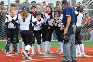 Rusty Rae/News-Register##
Dayton Pirates celebrate Kylee Hill’s grand slam home run in their semifinal game against Scio Tuesday at the Loggers’ home field. Rusty Rae/News-Register##
Dayton Pirates celebrate Kylee Hill’s grand slam home run in their semifinal game against Scio Tuesday at the Loggers’ home field.