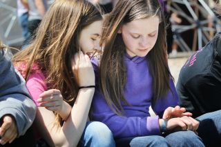Rockne Roll/News-Register##Kaylee Williams, right, shows classmate Ashley Dickens her media alert bracelet during recess at Yamhill-Carlton Intermediate School. Kaylee was recently diagnosed with diabetes. Rockne Roll/News-Register##Kaylee Williams, right, shows classmate Ashley Dickens her media alert bracelet during recess at Yamhill-Carlton Intermediate School. Kaylee was recently diagnosed with diabetes.