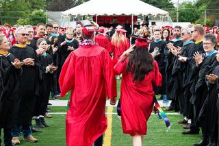 Marcus Larson/News-Register##
At the start of the ceremony, McMinnville High School seniors take their seats to the applause of their teachers. Marcus Larson/News-Register##
At the start of the ceremony, McMinnville High School seniors take their seats to the applause of their teachers.