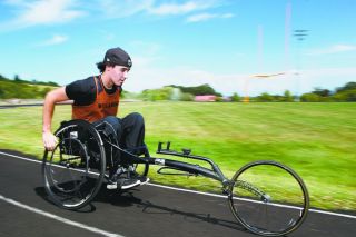 Rockne Roll/News-Register##
Willamina’s Owen Baker takes a lap around the track. He finished third in the para-1500 meter and won the para-shot put state title, both with personal bests. Rockne Roll/News-Register##
Willamina’s Owen Baker takes a lap around the track. He finished third in the para-1500 meter and won the para-shot put state title, both with personal bests.