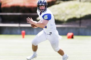 Rockne Roll/News-Register##
South All-Star quarterback Wyatt Smith, of McMinnville, scrambles out of the pocket during the 2017 Les Schwab Tires Bowl held Saturday at Hillsboro Stadium. Rockne Roll/News-Register##
South All-Star quarterback Wyatt Smith, of McMinnville, scrambles out of the pocket during the 2017 Les Schwab Tires Bowl held Saturday at Hillsboro Stadium.
