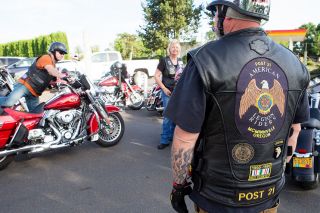 Rockne Roll/News-Register##Jerry Perry, right, and other American Legion Riders prepare for a group ride to Dayton at American Legion Post 21 in McMinnville. They went to support Rider Jim Connolly, who was playing with Second Winds in the Dayton park. Rockne Roll/News-Register##Jerry Perry, right, and other American Legion Riders prepare for a group ride to Dayton at American Legion Post 21 in McMinnville. They went to support Rider Jim Connolly, who was playing with Second Winds in the Dayton park.