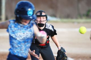 Logan Brandon/News-Register##
Mcminnville’s Mackenzie Bekofsky flips the ball to first base for an out in Friday’s playoff contest against Synergy. Logan Brandon/News-Register##
Mcminnville’s Mackenzie Bekofsky flips the ball to first base for an out in Friday’s playoff contest against Synergy.