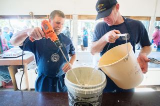 Rockne Roll/News-Register##Steve Ruyle, left, and Mo Larmi mix up pancake batter at the 60th Annual Amity Pancake Breakfast and Classic Car Show on Sunday in Amity City Park. Rockne Roll/News-Register##Steve Ruyle, left, and Mo Larmi mix up pancake batter at the 60th Annual Amity Pancake Breakfast and Classic Car Show on Sunday in Amity City Park.
