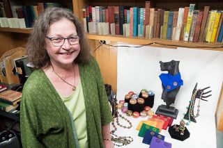 Marcus Larson/News-Register##Gail Krenecki displays examples of the polymer clay items she has made and sold, including beads, buttons and figurines. She is now teaching other artists and crafters how to make money from their creations. Marcus Larson/News-Register##Gail Krenecki displays examples of the polymer clay items she has made and sold, including beads, buttons and figurines. She is now teaching other artists and crafters how to make money from their creations.