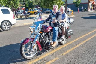 Marcus Larson/News-Register##Queen Mary Baker and King James Connelly ride a motorcycle in the Dayton Old Timers parade. Riding a motorcycle has always been on Mary Baker s bucket list. Marcus Larson/News-Register##Queen Mary Baker and King James Connelly ride a motorcycle in the Dayton Old Timers parade. Riding a motorcycle has always been on Mary Baker s bucket list.