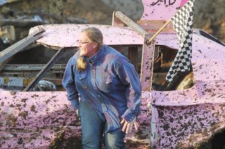 Rockne Roll/News-Register##
Susy Fleming is all smiles after she took the checkered flag in the V-8 demo derby. Rockne Roll/News-Register##
Susy Fleming is all smiles after she took the checkered flag in the V-8 demo derby.