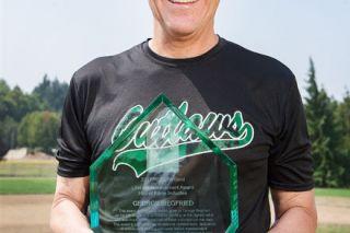 Rockne Roll/News-Register##
Pitcher George Siegfried, pictured at Joe Dancer Park Wednesday with his Hall of Fame trophy. Rockne Roll/News-Register##
Pitcher George Siegfried, pictured at Joe Dancer Park Wednesday with his Hall of Fame trophy.