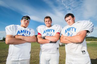 Marcus Larson/News-Register##
Amity will have the luxury of three returning starters on its offensive line in (from the left), Ivan Ramirez, Robby Scharf, and Alex Nyseth. Marcus Larson/News-Register##
Amity will have the luxury of three returning starters on its offensive line in (from the left), Ivan Ramirez, Robby Scharf, and Alex Nyseth.