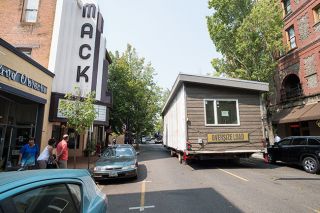 Marcus Larson/News-Register##
A manufactured home stops right next to the Mack Theater just a few feet before hitting telephone and fiber lines on Evans and Third St. Marcus Larson/News-Register##
A manufactured home stops right next to the Mack Theater just a few feet before hitting telephone and fiber lines on Evans and Third St.
