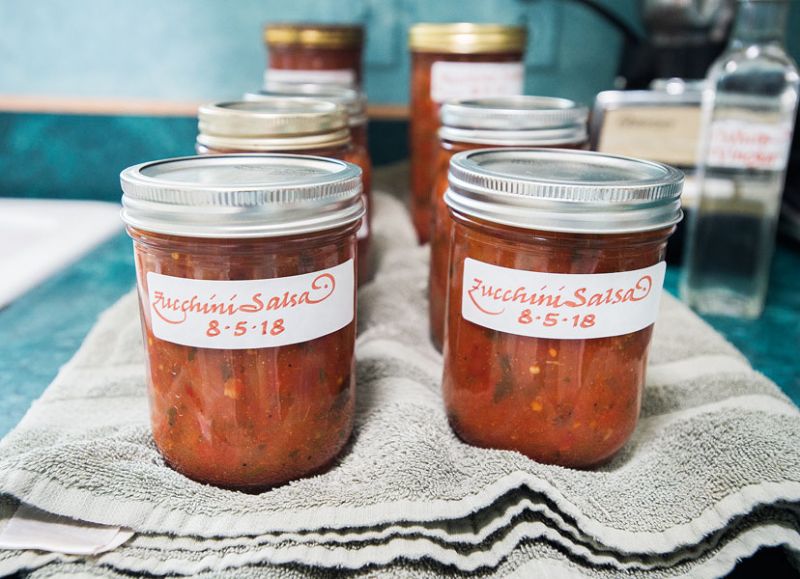 Marcus Larson/News-Register##Jars of home-canned salsa are embellished with calligraphed labels.