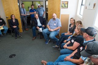 Marcus Larson/News-Register##Gov. Kate Brown, left, and Sen. Jeff Merkley discuss issues with area farmers during a visit to Organic Valley Creamery in McMinnville. Marcus Larson/News-Register##Gov. Kate Brown, left, and Sen. Jeff Merkley discuss issues with area farmers during a visit to Organic Valley Creamery in McMinnville.