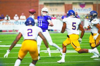 Marcus Larson/News-Register##
Linfield’s Troy Fowler faces a stiff rush from the Mary Hardin-Baylor defense in Linfield’s game Saturday at Maxwell Field. The ‘Cats dropped a 24-3 decision to number-one rated UMHB. Marcus Larson/News-Register##
Linfield’s Troy Fowler faces a stiff rush from the Mary Hardin-Baylor defense in Linfield’s game Saturday at Maxwell Field. The ‘Cats dropped a 24-3 decision to number-one rated UMHB.