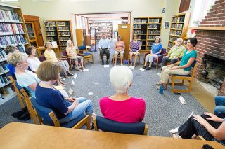 Marcus Larson/News-Register##In Amy Halloran-Steiner’s hour-long class in the Silent Room of the McMinnville Public Library, students learn to reduce stress through mindfulness meditation. Sessions will continue at noon Mondays through Nov. 13. Anyone can join at any time until then, Halloran-Steiner said. Marcus Larson/News-Register##In Amy Halloran-Steiner’s hour-long class in the Silent Room of the McMinnville Public Library, students learn to reduce stress through mindfulness meditation. Sessions will continue at noon Mondays through Nov. 13. Anyone can join at any time until then, Halloran-Steiner said.