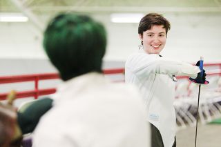 Rockne Roll/News-Register##Devon Loukas, right, instructs Aaron Russ in parrying techniques for saber combat at Rutschman Field House at Linfield College. Both are members of the school’s fencing club. Rockne Roll/News-Register##Devon Loukas, right, instructs Aaron Russ in parrying techniques for saber combat at Rutschman Field House at Linfield College. Both are members of the school’s fencing club.