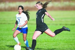 Marcus Larson/News-Register##
Dayton s Lynsey Katzler (2) fires a shot while being marked by Amity s Vanessa Hernandez during Monday s contest against Amity. Katzler registered a goal and an assist in the 2-1 victory. Marcus Larson/News-Register##
Dayton s Lynsey Katzler (2) fires a shot while being marked by Amity s Vanessa Hernandez during Monday s contest against Amity. Katzler registered a goal and an assist in the 2-1 victory.