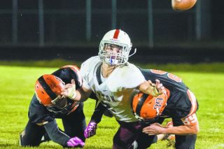 Malia Riggs/for the News-Register##
Dayton’s Zach Russell (2) fumbles when tackled by Willamina’s True Gibbons (2) and Abel Vanecek (89). Malia Riggs/for the News-Register##
Dayton’s Zach Russell (2) fumbles when tackled by Willamina’s True Gibbons (2) and Abel Vanecek (89).