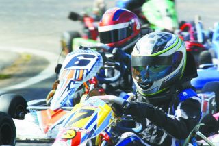 Rockne Roll/News-Register##
Bryce Smark in car number six, and Mason Smark in car seven, battle early in their heat race. Rockne Roll/News-Register##
Bryce Smark in car number six, and Mason Smark in car seven, battle early in their heat race.