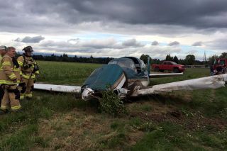 Photo courtesy McMinnville Fire Department##Two Seattle-area men sustained minor injuries when the plan they were occupying crashed Monday night in the area of Lafayette Highway and Leach Lane.