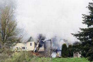 Rockne Roll/News-Register##
Firefighters from multiple agencies respond to a house fire along Lafayette Highway north of Hopewell Wednesday afternoon. Rockne Roll/News-Register##
Firefighters from multiple agencies respond to a house fire along Lafayette Highway north of Hopewell Wednesday afternoon.