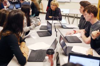 Rockne Roll/News-Register##Education secretary Betsy DeVos listens to students discuss poetry in Matt Brisbin s class at Mac High Wednesday afternoon. She also visited AVID and U.S. history classes. Rockne Roll/News-Register##Education secretary Betsy DeVos listens to students discuss poetry in Matt Brisbin s class at Mac High Wednesday afternoon. She also visited AVID and U.S. history classes.