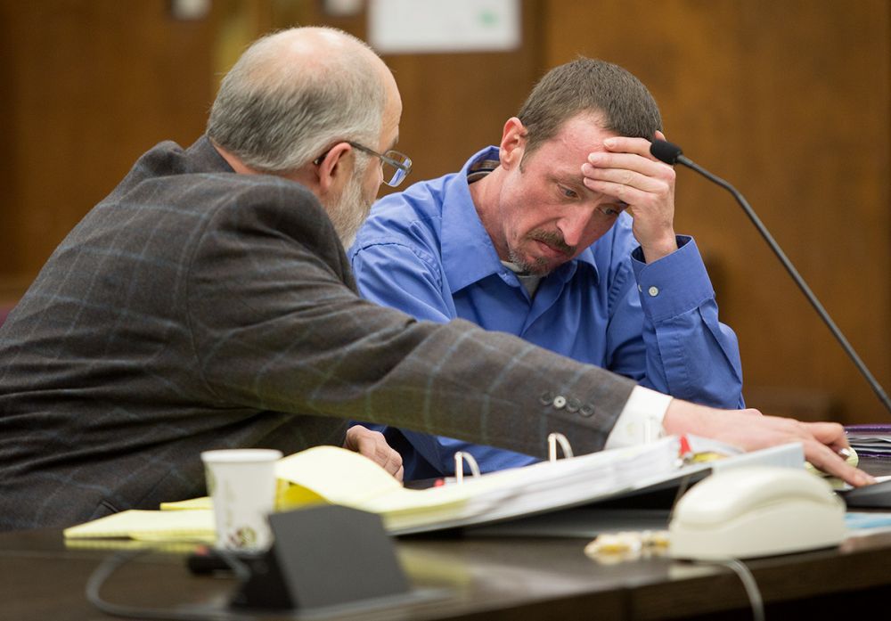 Rockne Roll / News-Register##Timothy McCready, right, reacts to testimony from Steve Livasy Wednesday during his manslaughter trial  in the Yamhill County Courthouse.